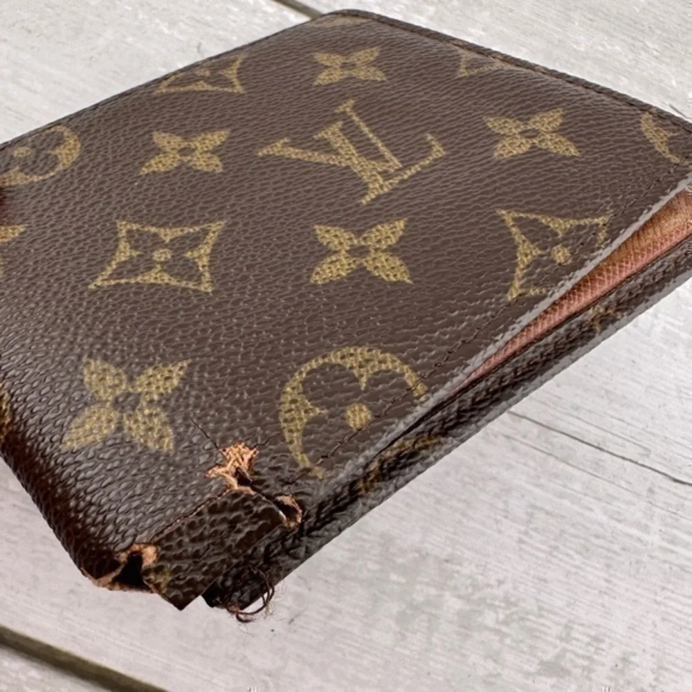 AUTHENTIC Louis Vuitton Monogram Multiple Wallet. Monogram brown.
